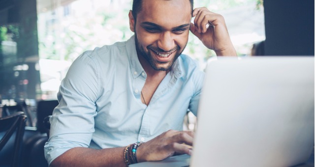 Man Using Online Program Designing Online Learning to Spark Intrinsic Motivation