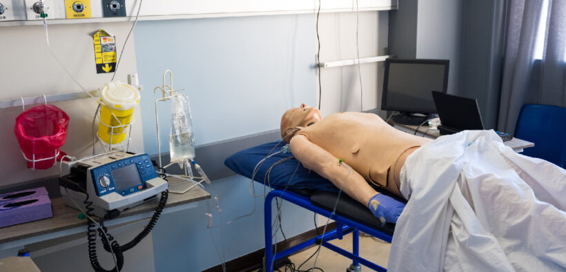 Image of a test dummy in a hospital bed